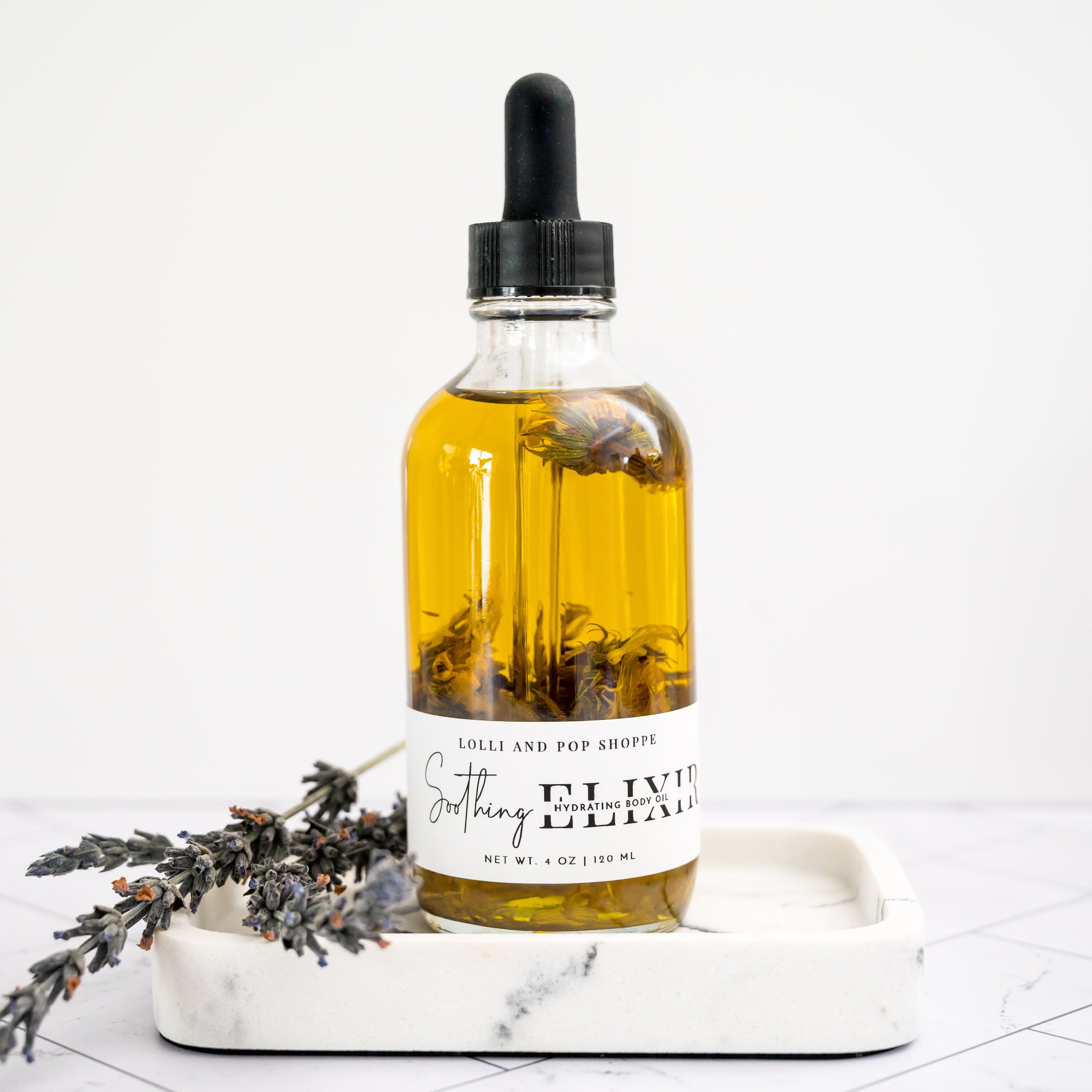 a bottle of liquid sitting on top of a tray